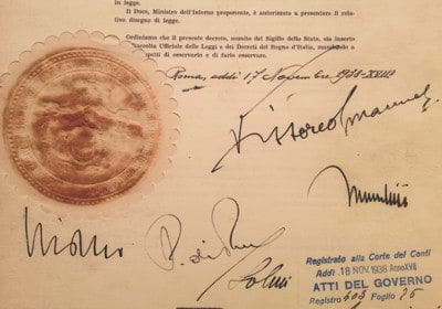 le firme del Re, di Mussolini, Galeazzo Ciano, Paolo Thaon di Revel e Arrigo Solmi sul Regio Decreto Legge 7 settembre 1938 n. 1381 (discriminazioni razziali degli ebrei)